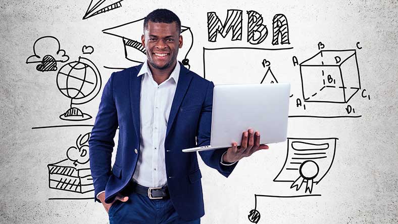 MBA general student holding a laptop