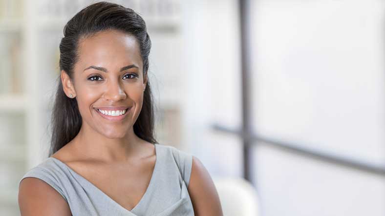 Difference between bachelor of law and juris doctor, female student smiling